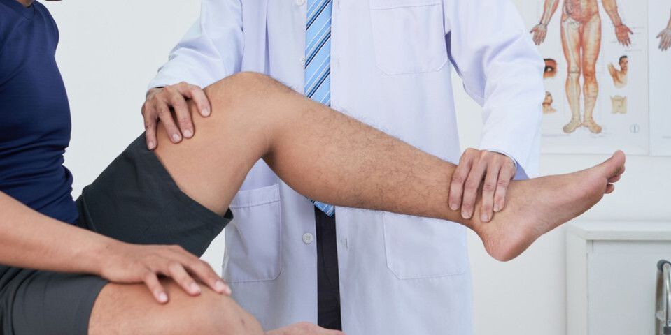 Examining the doctor's knee